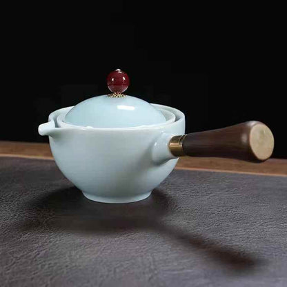 Ceramic Rotating Teapot - BINZAAR
