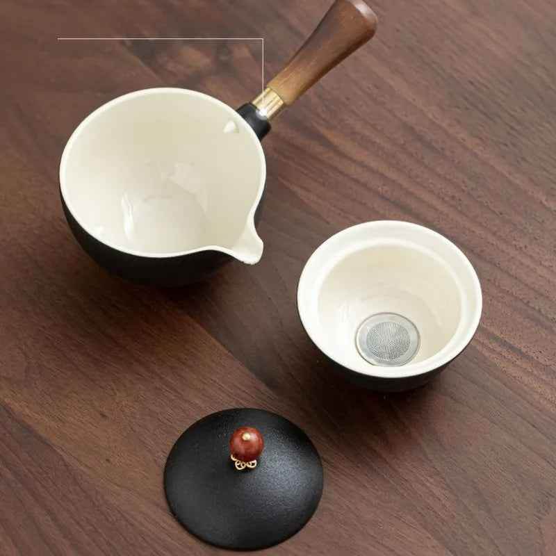 Ceramic Rotating Teapot - BINZAAR