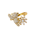 Gold ring with diamond accents on a white background