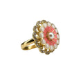 Gold ring with a pink floral design and pearls on a white background